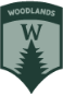 Woodlands Trail program logo